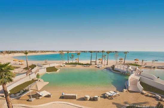 The resort's lagoon pool and beach